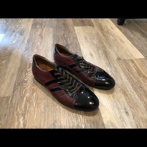 Maroon shoes with shiny toe